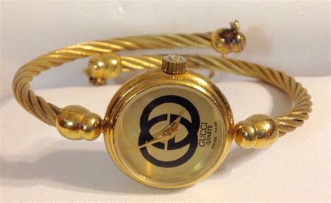 gucci watch 2047l|Gucci 2047 1l Gold Plated Quartz Cable Bangle Gold Face .